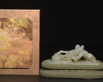 A Chinese Carved Jade Fishermen Statuette