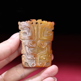 A Chinese Carved Jade Dragon Pendant