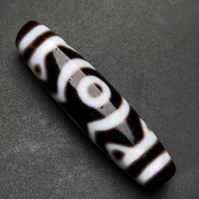 A Chinese Carved Agate DZI Bead