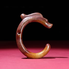 A Chinese Carved Jade Dragon Pendant