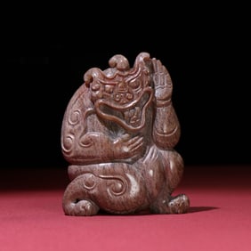 A Chinese Carved Jade Bear Statuette