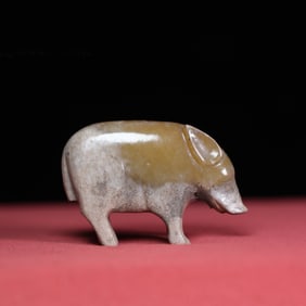A Chinese Carved Jade Pig Statuette