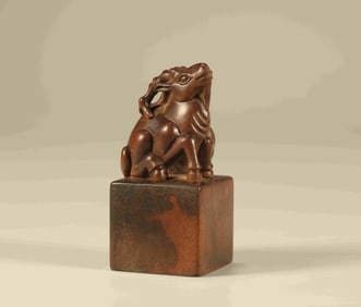 A Chinese Carved Hardwood Foo-Dog Handle Seal