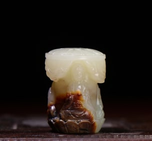 A Chinese Carved Jade Buddhist Bead