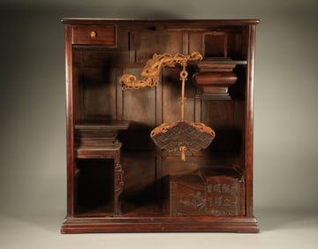 A Chinese Carved Hardwood Cabinet