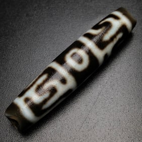 A Chinese Carved Agate DZI Bead