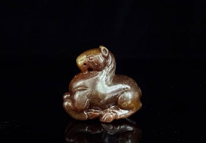 A Chinese Carved Jade Horse Statuette