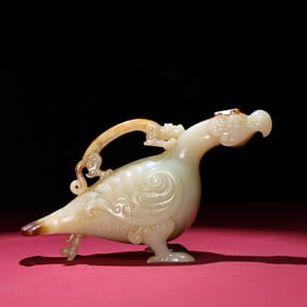 A Chinese Carved Jade Bird Statuette