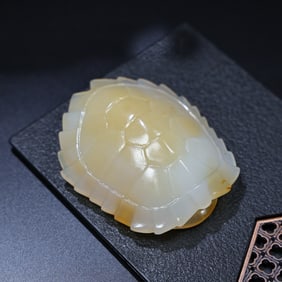 A Chinese Carved Jade Turtle Shell Pendant
