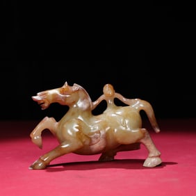 A Chinese Carved Jade Horse with Rider Statuette