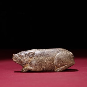 A Chinese Carved Jade Pig Statuette