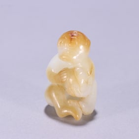 A Chinese Carved Jade Monkey Statuette