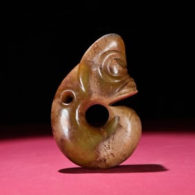 A Chinese Carved Jade Dragon Pendant