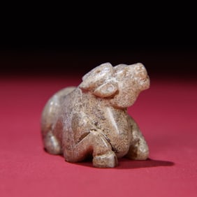 A Chinese Carved Jade Bull Statuette