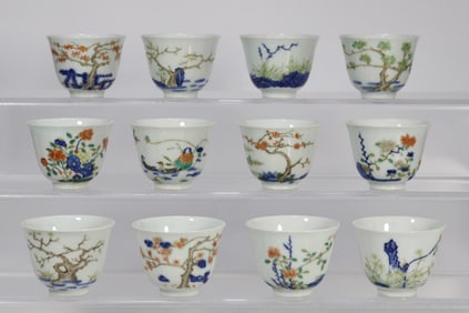 A Set of 12 Chinese Wu-Cai Glazed Porcelain Cups