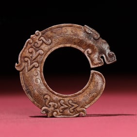 A Chinese Carved Jade Dragon Ring Pendant