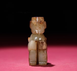 A Chinese Carved Jade Figure of Seated Man