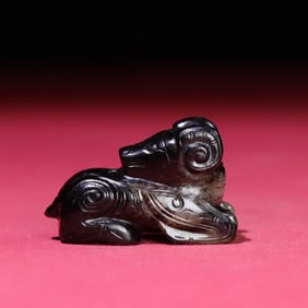 A Chinese Carved Jade Goat Statuette