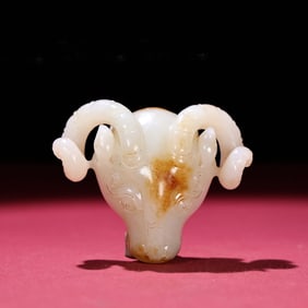 A Chinese Carved Jade Goat Head Statuette