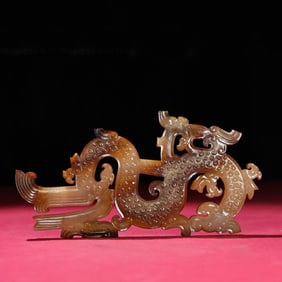 A Chinese Carved Jade Dragon Pendant