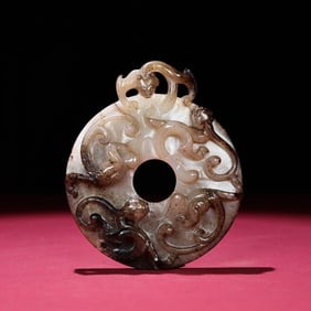 A Chinese Carved Jade Dragon Ring Pendant