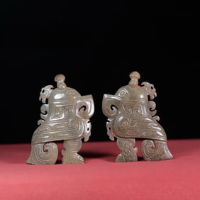 A Pair of Chinese Carved Jade Bird Pendants