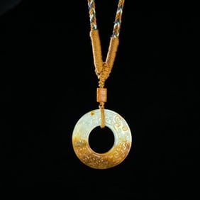 A Chinese Carved Jade Dragon Ring Pendant