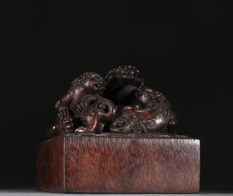 A Chinese Carved Agar-Wood Foo-Dog Seal