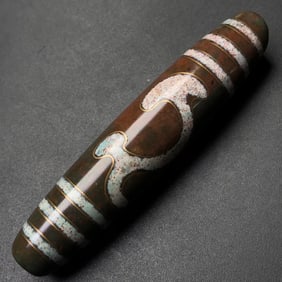 A Chinese Carved Agate DZI Bead
