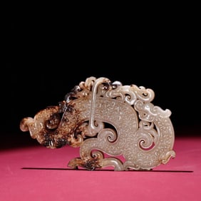 A Chinese Carved Jade Dragon and Phenix Pendant