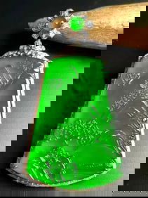 A Chinese Carved Jadeite Pendant