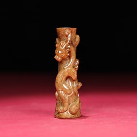 A Chinese Carved Jade Dragon Bead
