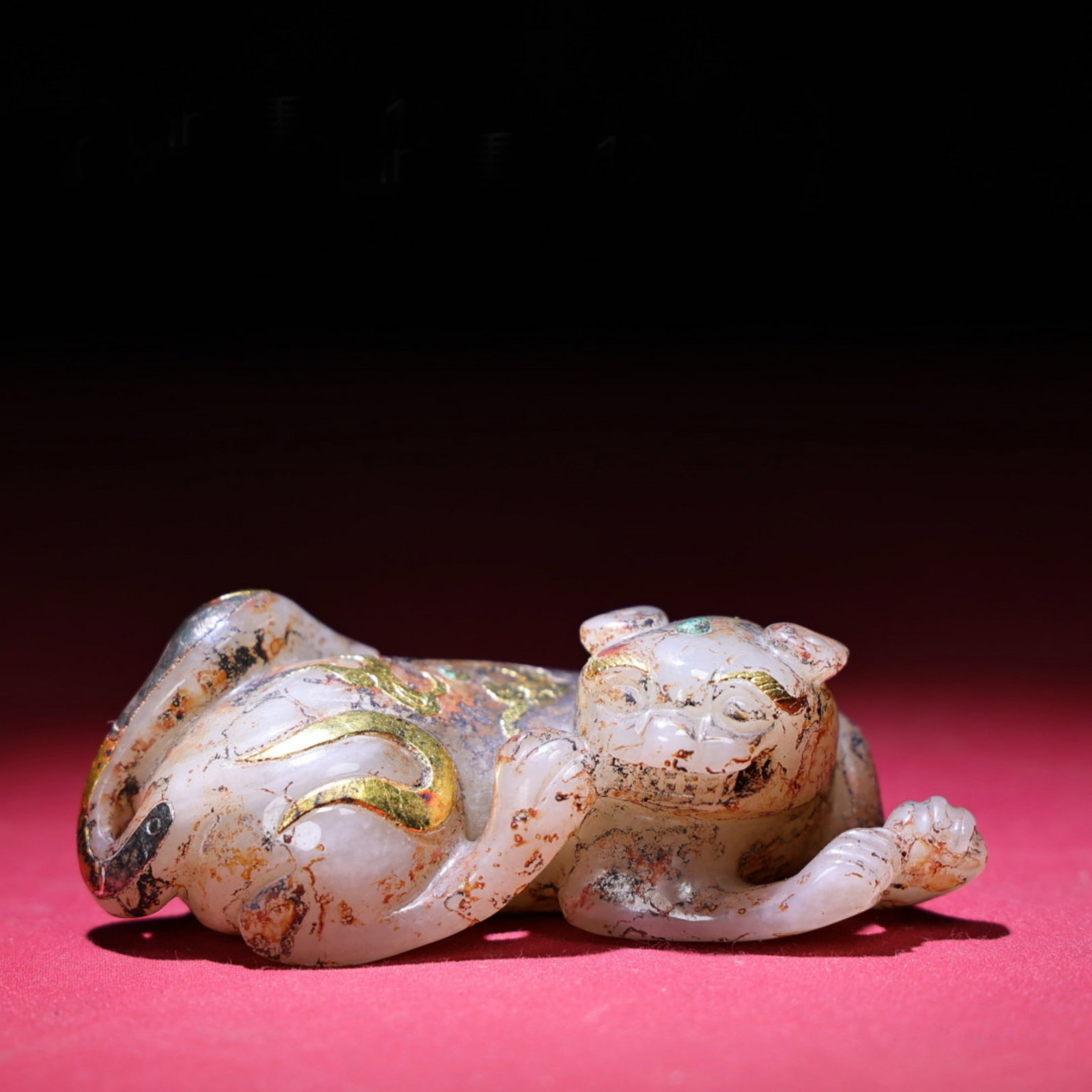 A Chinese Carved Jade Tiger Statuette