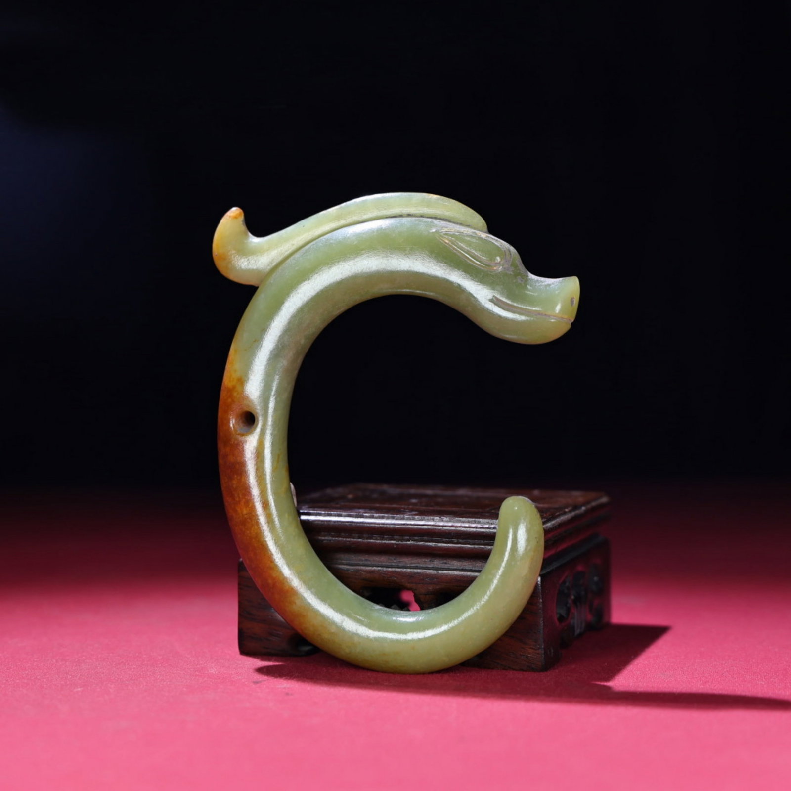 A Chinese Carved Jade Dragon Pendant: Ht. 9.3cm, Lg. 11.6cm, Th. 1.4cm, Wt. 127g