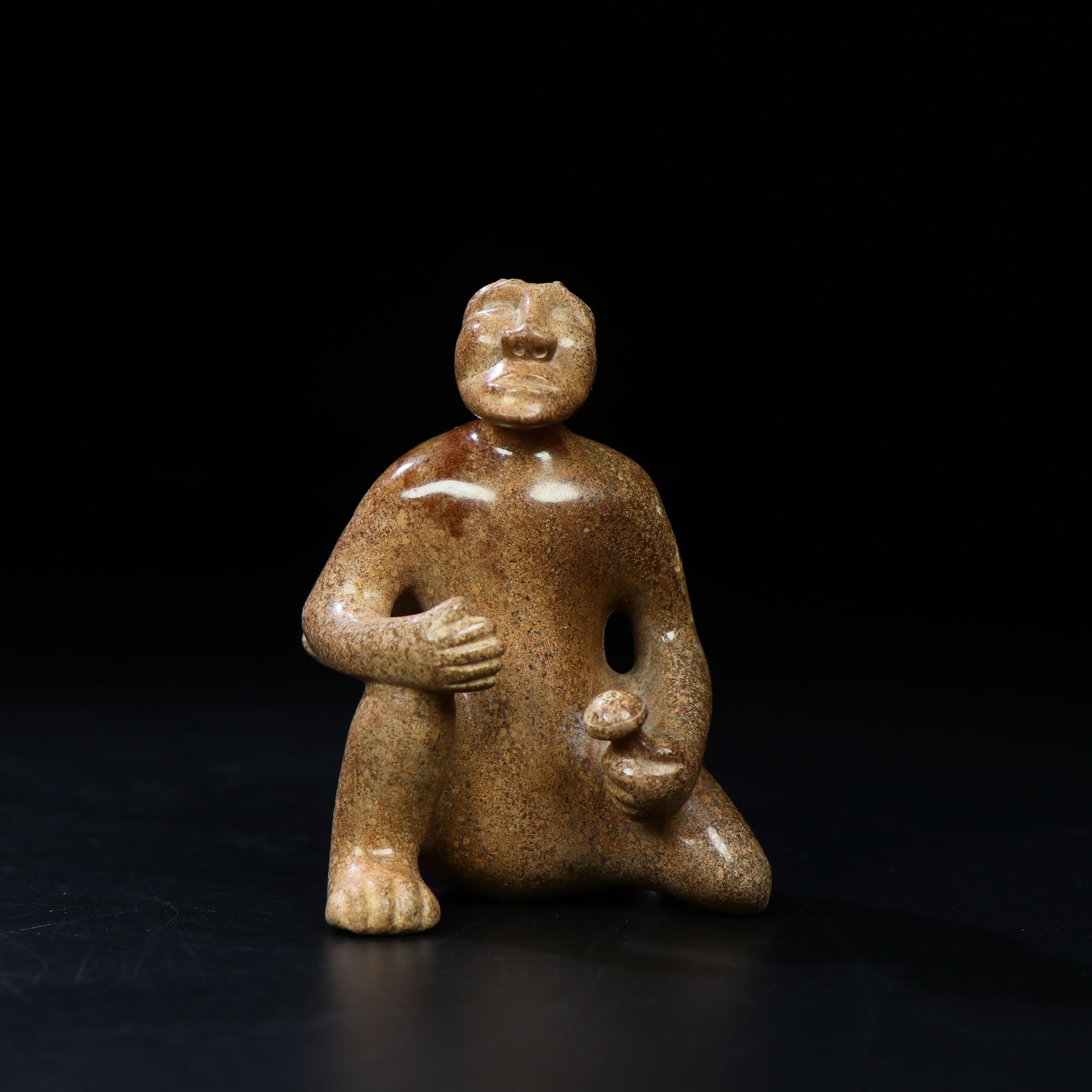 A Chinese Carved Jade Figure of Kneeling Man: Ht. 7.5cm, Wd. 5.8cm, Wt. 138g