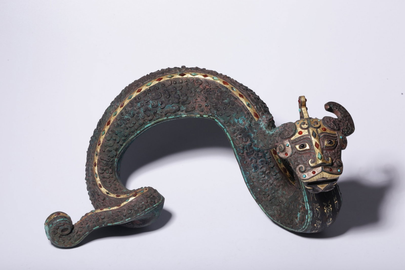 A Chinese Gilt Bronze, Silver and Gold Dragon Statuette: Ht. 16.5cm, Lg. 32.5cm, Wd. 19cm, Wt. 2297g