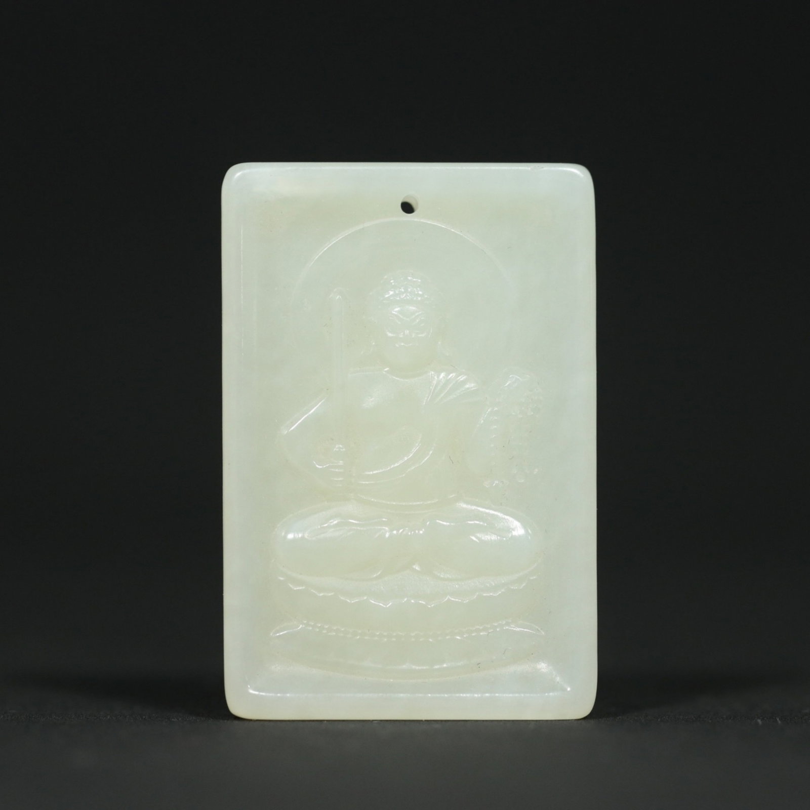 A Chinese Carved Jade Buddhist Pendant: Lg. 4.5cm, Wd. 3cm, Th. 0.6cm, Wt. 17.6g