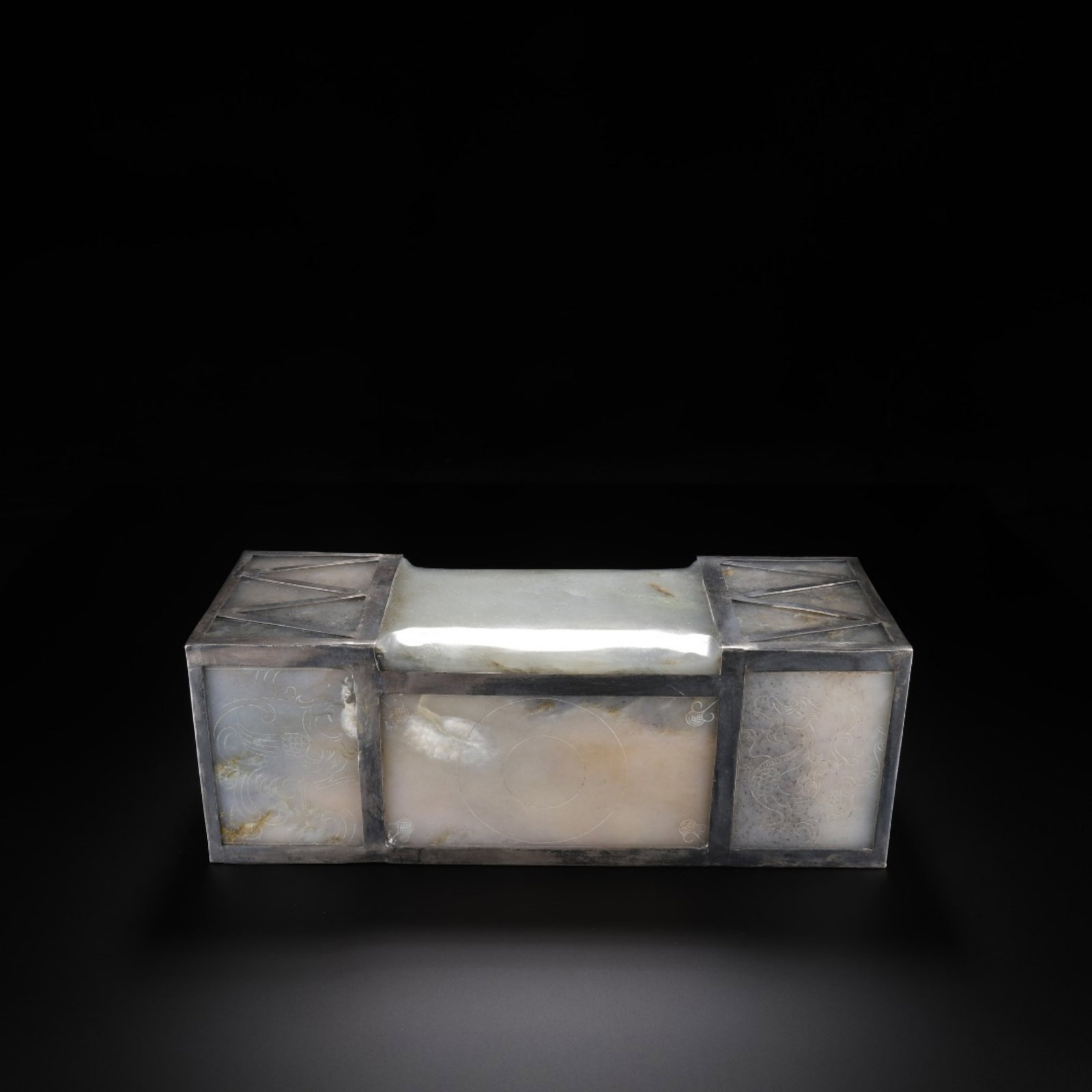 A Chinese Carved Jade Pillow: Lg. 20.9cm, Wd. 7.2cm, Ht. 7.6cm, Wt. 1297g