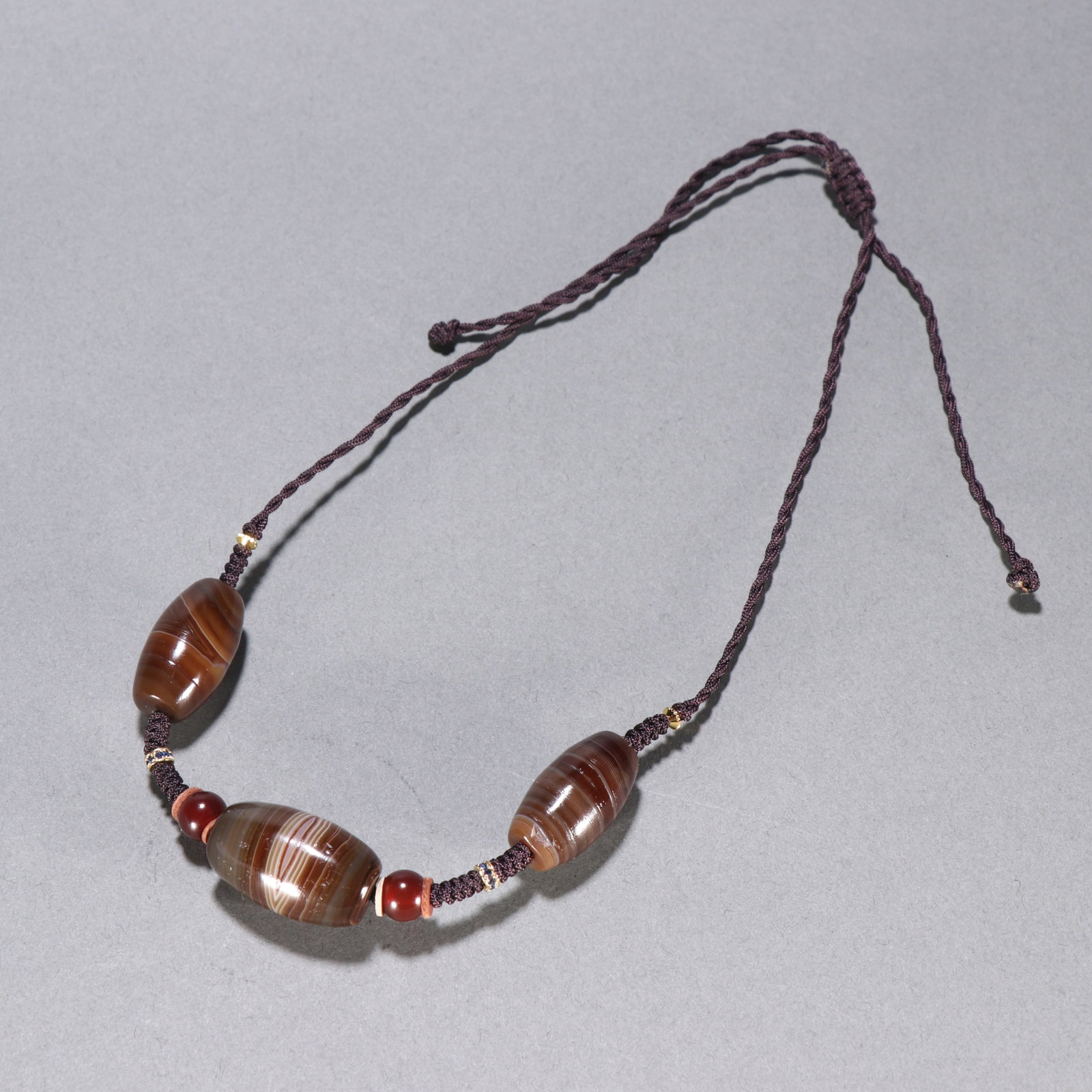 A Chinese Carved Agate Necklace