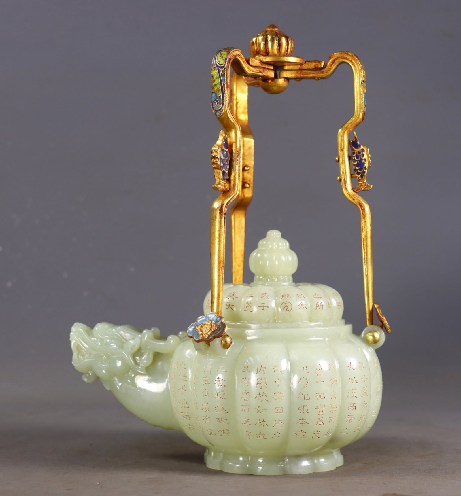 A Chinese Carved Jade Dragon Head Tea Pot: Ht. 23cm, Lg. 16cm, Wd. 10cm, Wt. 630g
