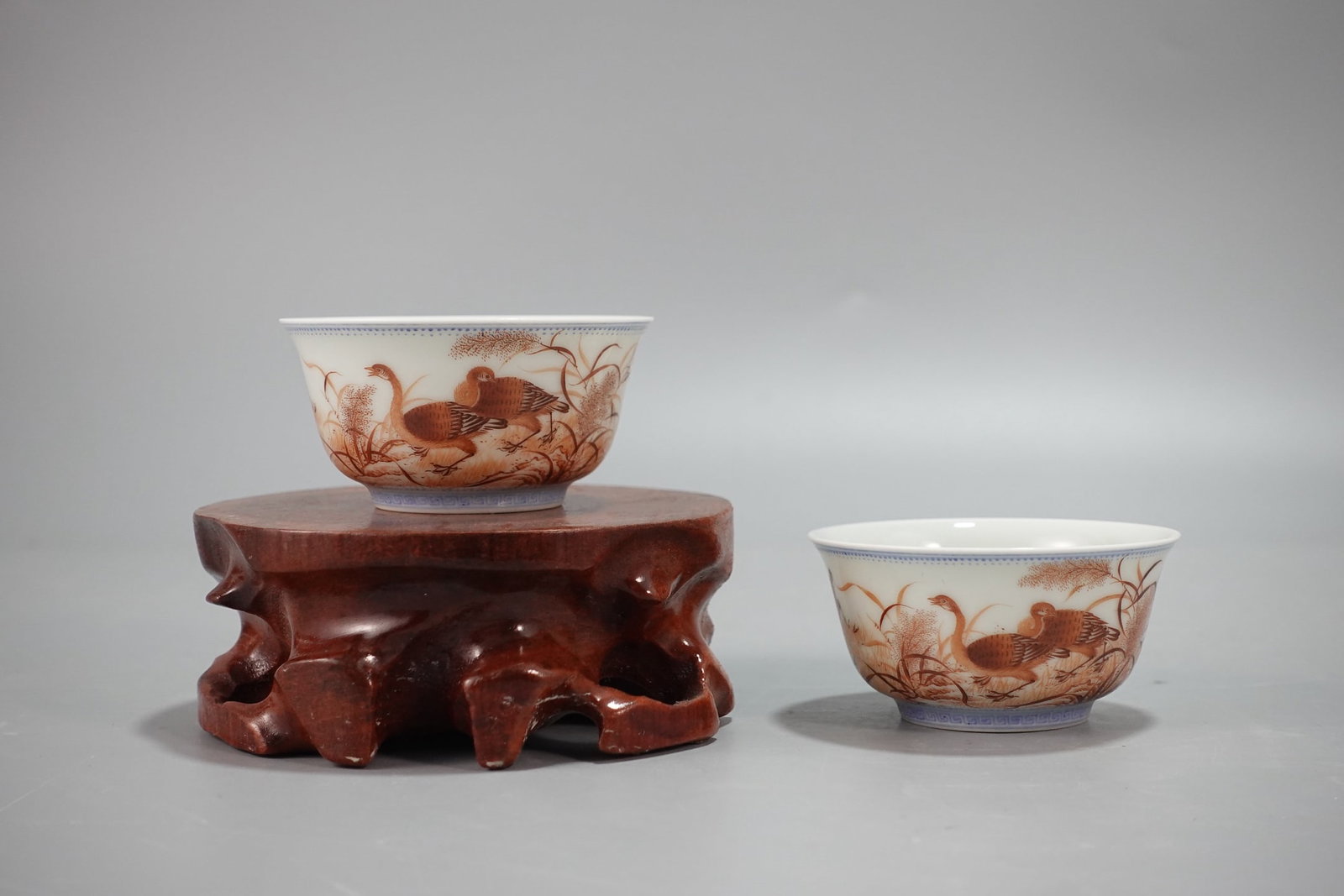 A Pair of Chinese Iron-Red Glazed Porcelain Cups: Ht. 3.8cm, Diam. 7.5cm