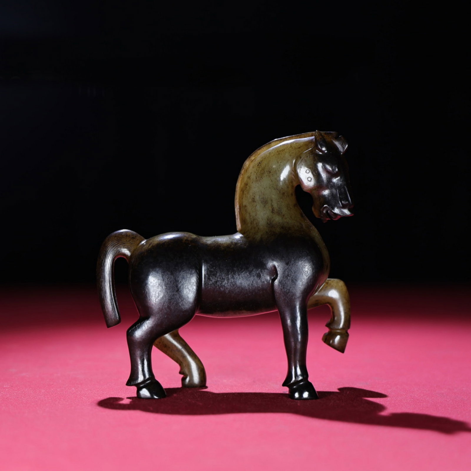 A Chinese Carved Jade Horse Statuette: Lg. 12.2cm, Wd. 13.2cm, Wd. 4.1cm, Wt. 426g