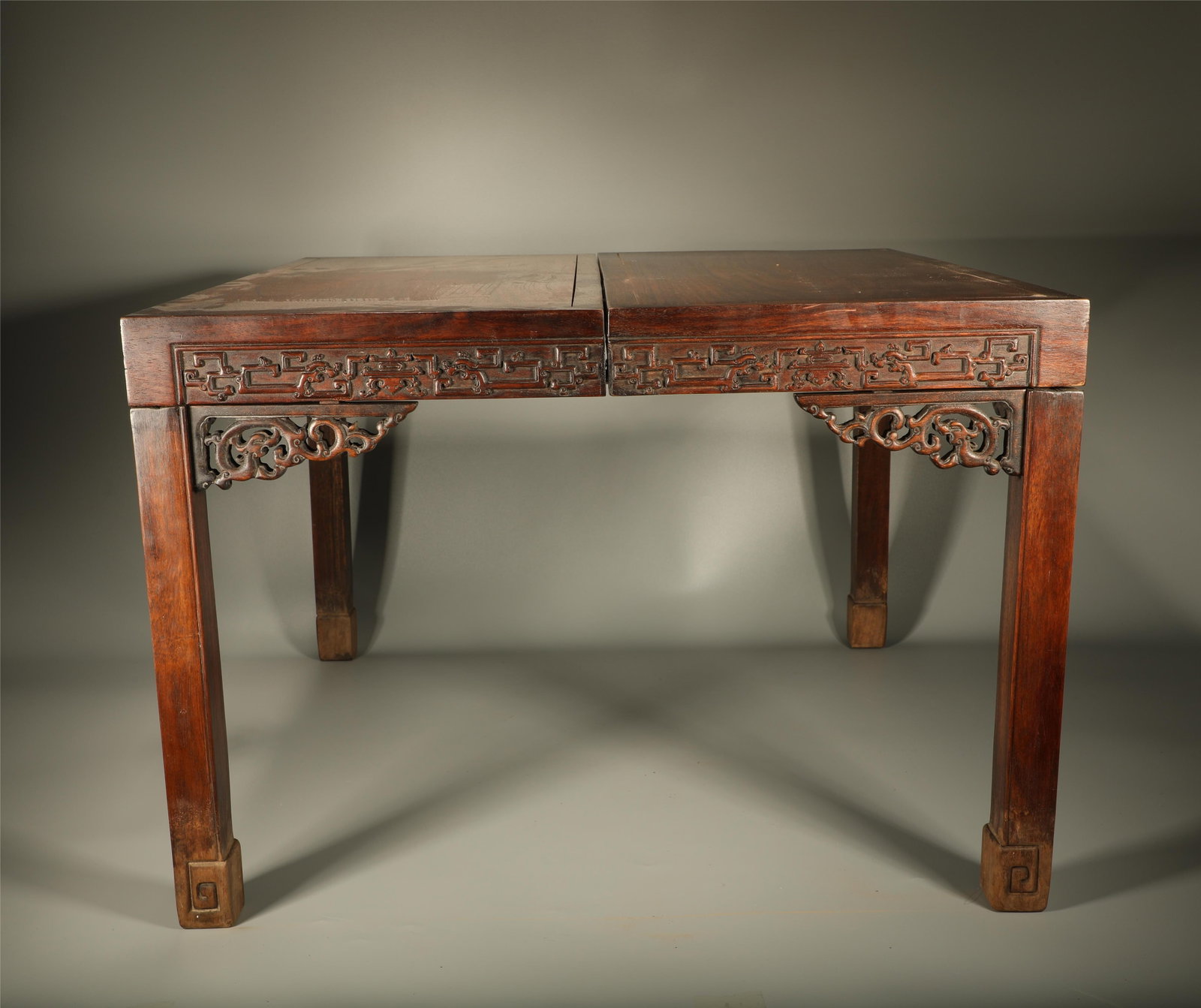 A Chinese Carved Hardwood Folding Table: Lg. Wd. 60cm, Ht. 42cm