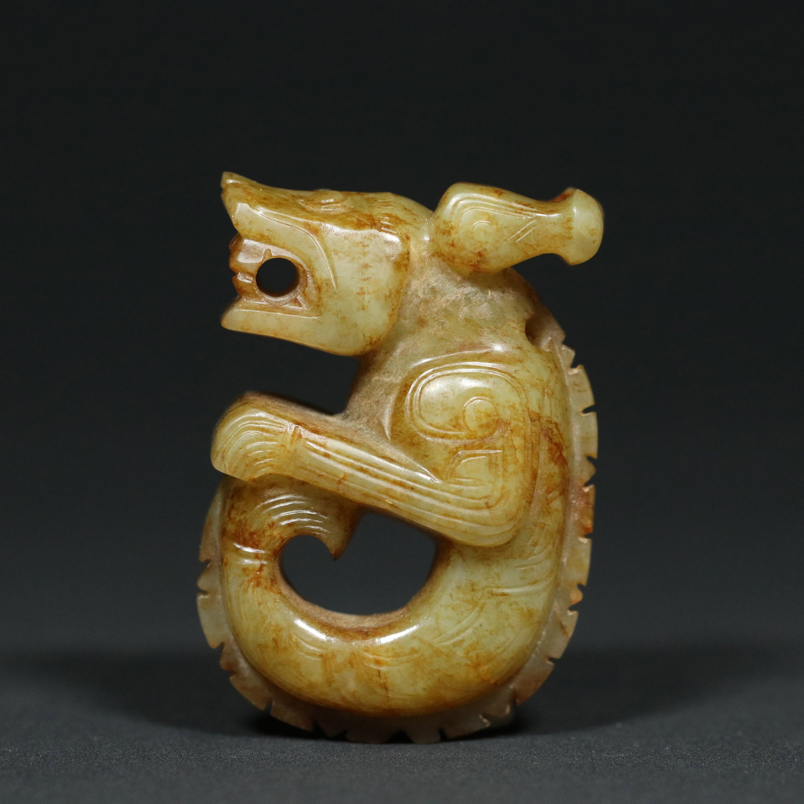 A Chinese Carved Jade Dragon Statuette: Lg. 5.9cm, Wd. 4cm, Th. 2.4cm, Wt. 75.3g