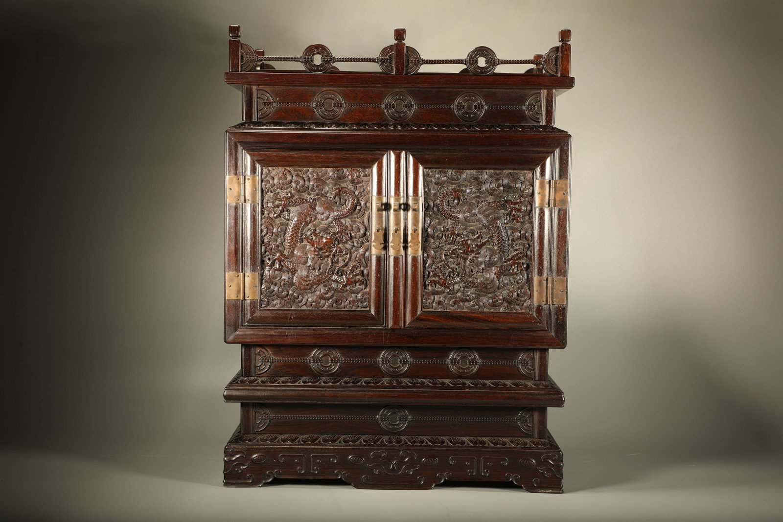 A Chinese Carved Hardwood Buddhist Cabinet: Lg. 45cm, Wd. 28cm, Ht. 61cm