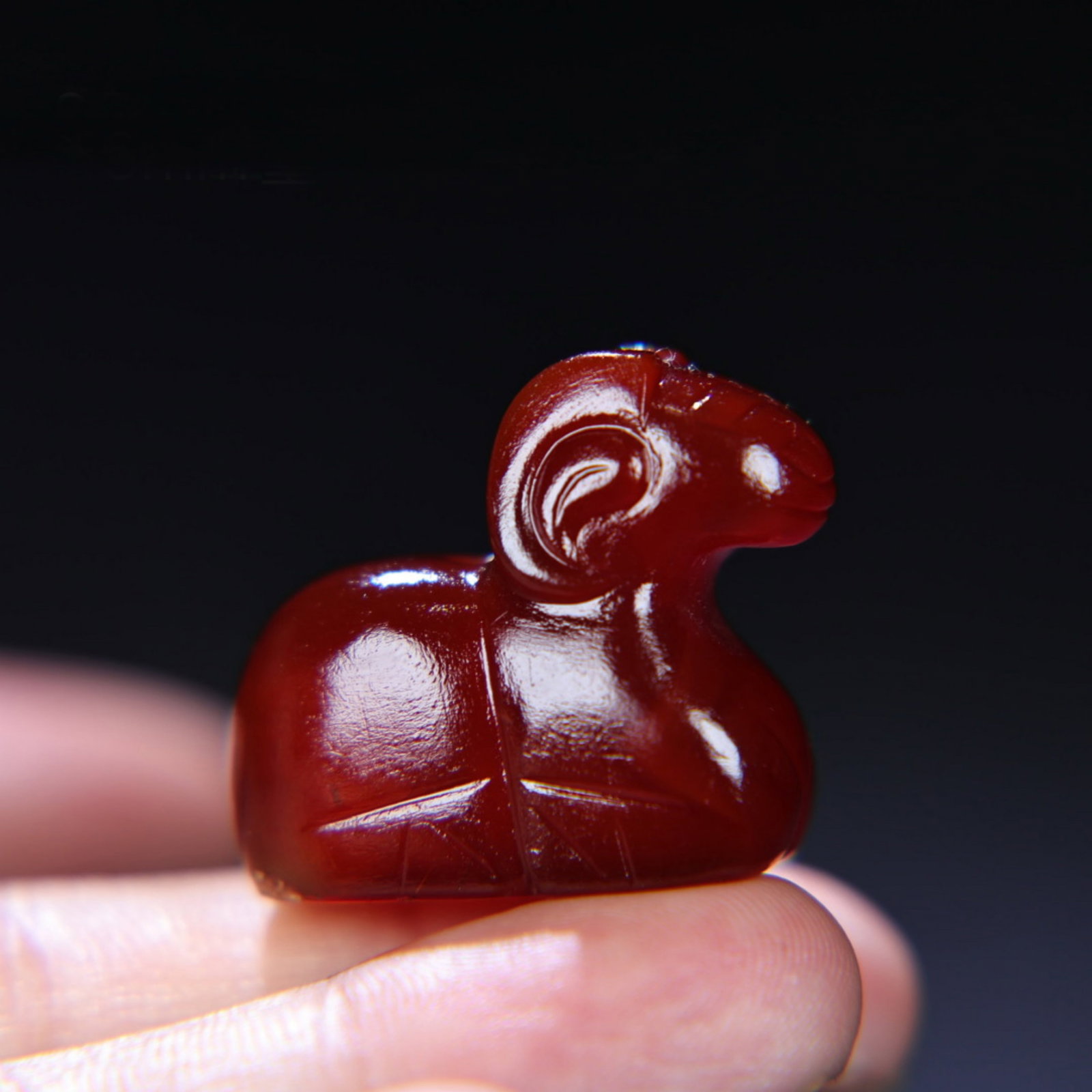 A Chinese Carved Agate Goat Statuette