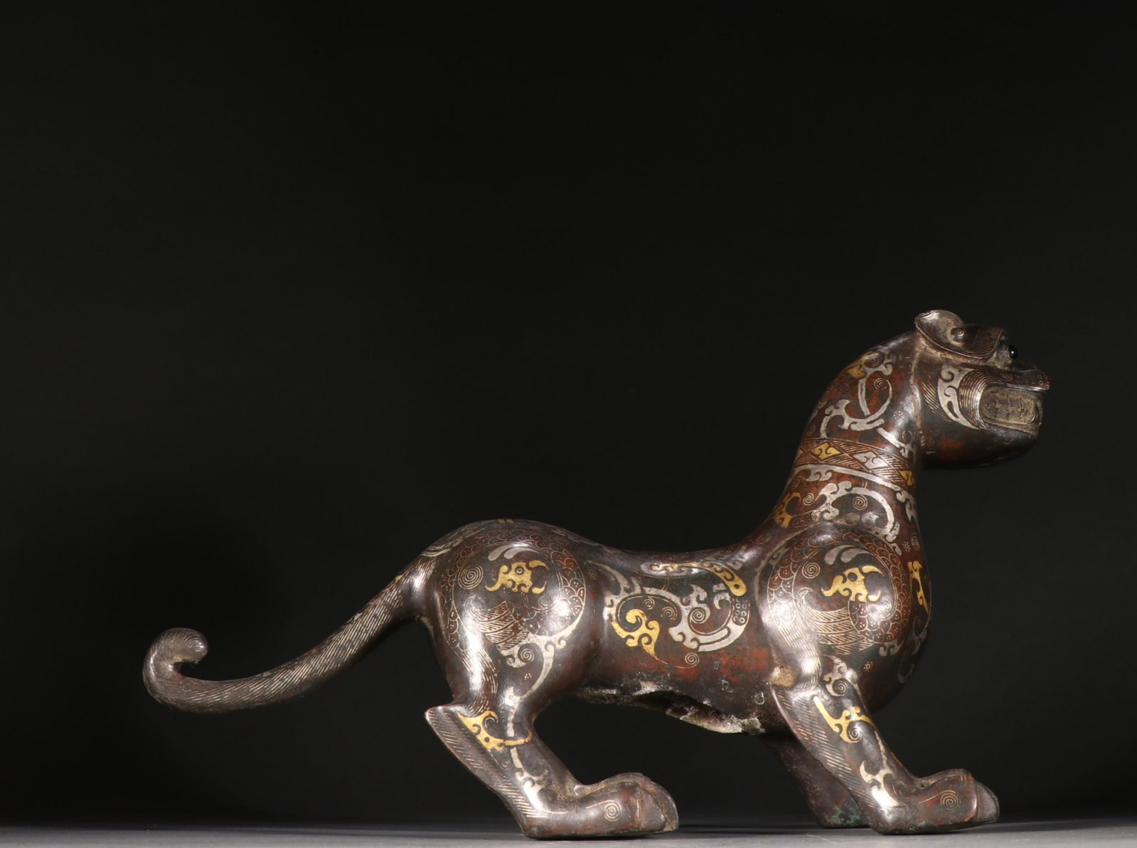 A Chinese Gilt Bronze, Silver and Gold Foo-Dog Statuette (1 of 9)