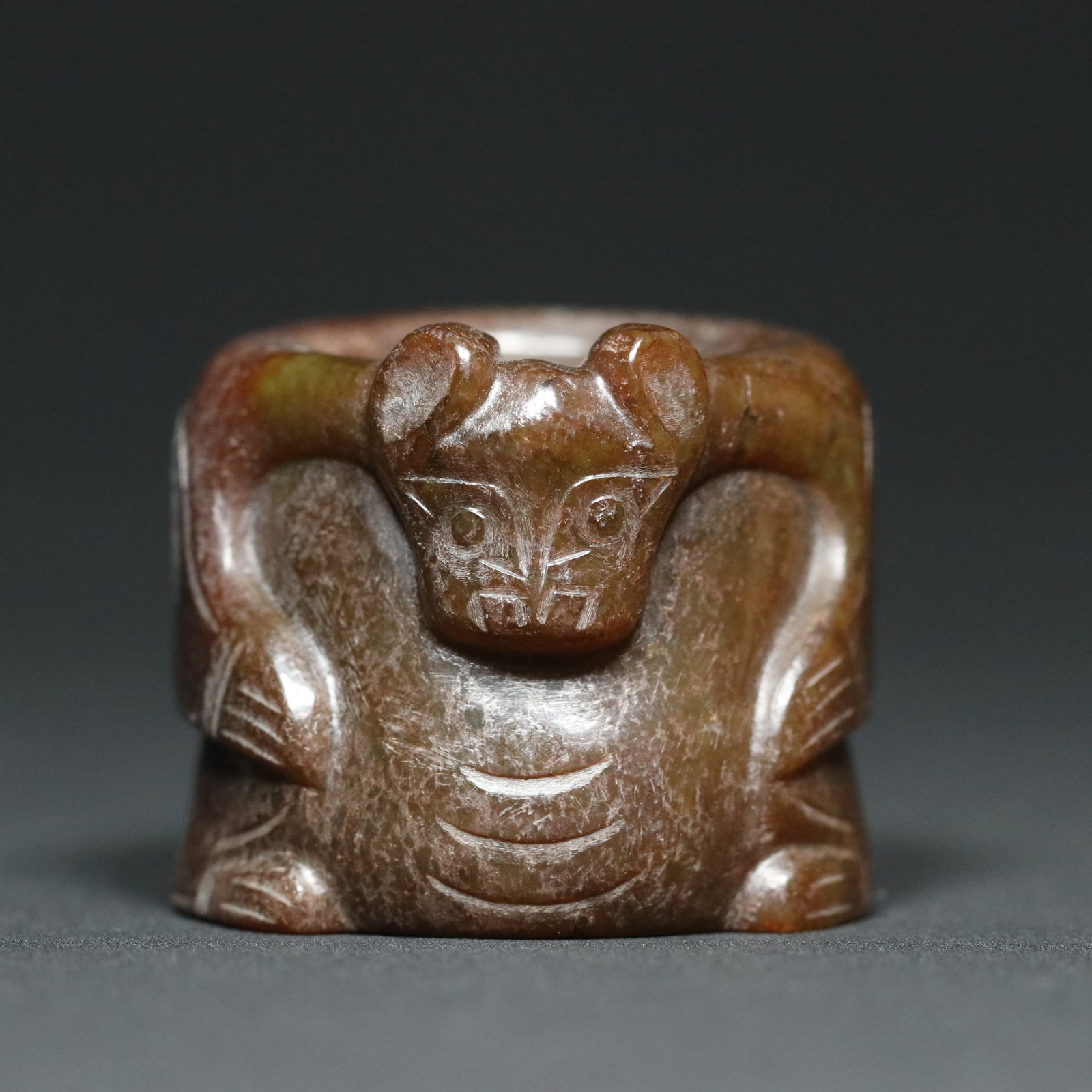 A Chinese Carved Jade Bear Ring: Ht. 3.3cm, Wd. 3.9cm, Diam. 2.3cm, Wt. 59.5g
