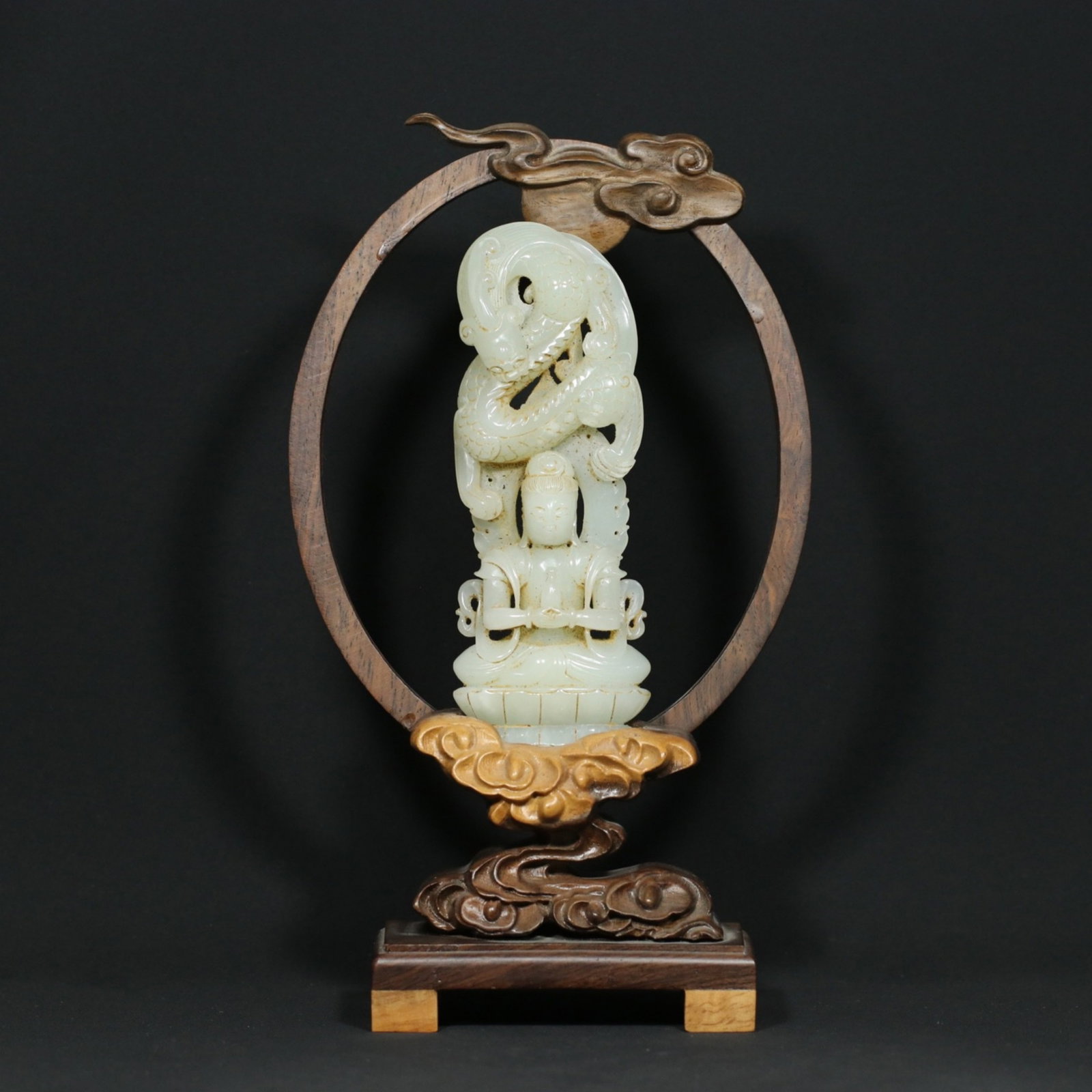 A Chinese Carved Jade Dragon and Buddha Statuette: Ht. 24cm, the Jade, Ht. 14cm, Wd. 5.2cm, Th. 2cm, Wt. 163.7g