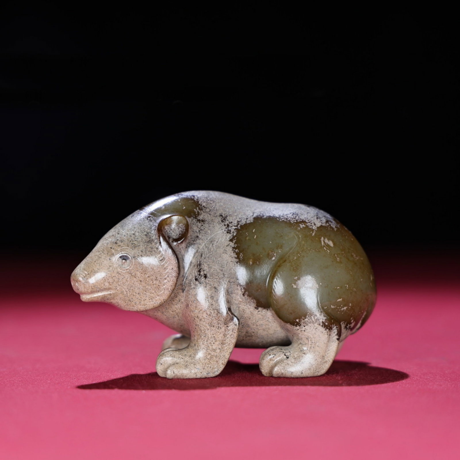 A Chinese Carved Jade Bear Statuette: Lg. 9.5cm, Wd. 5.6cm, Th. 4.6cm, Wt. 307g